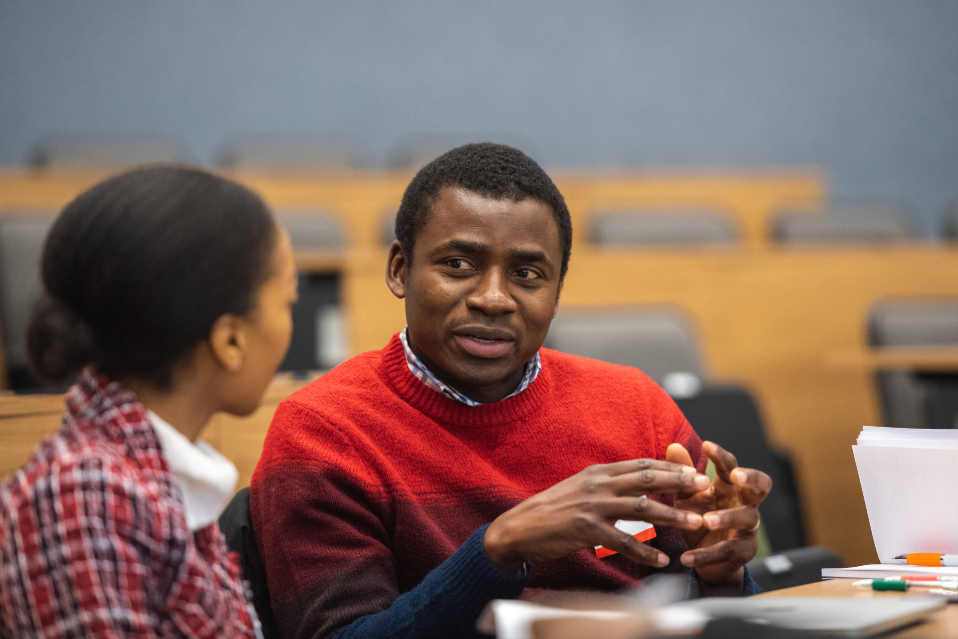 Two conference attendees have a discussion